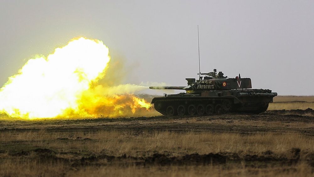 U.S., Romanian, and Moldovan military members participate in a tank shoot rehearsal during Platinum Lynx 16-2 at Smardan…