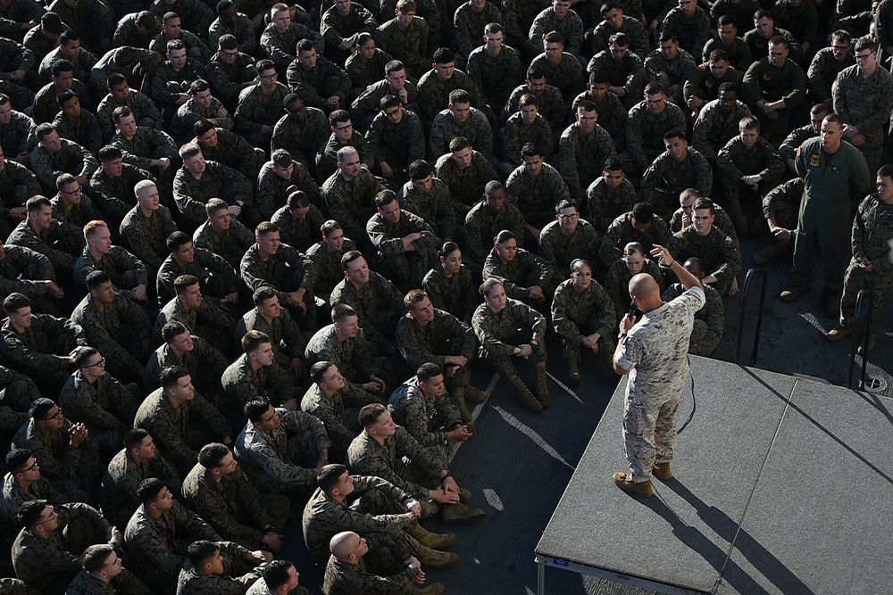 170808-N-TH560-440 CORAL SEA (Aug. 8, 2017) The Commandant of the Marine Corps, Gen. Robert B. Neller, addresses Marines and…