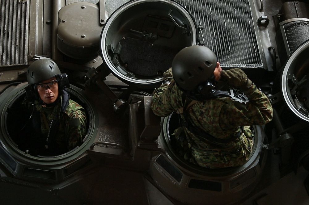 Japan Ground Self-Defense Force soldiers embark on the dock landing ship USS Ashland (LSD 48) in an assault amphibious…