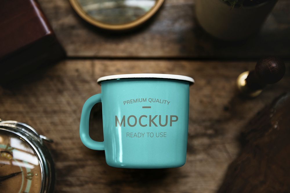 Aerial view of a teal blue cup mockup