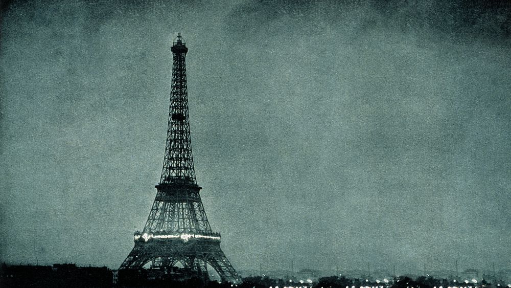 Lightning striking Eiffel Tower desktop wallpaper, vintage photograph. Remixed by rawpixel.