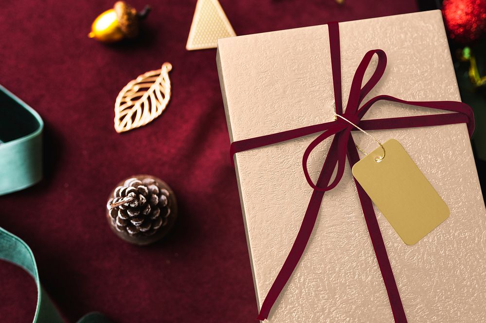 Aerial view of gift box with a tag mockup