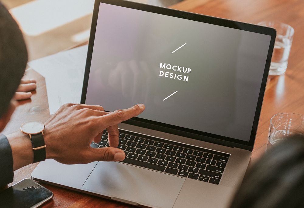 Businessman using a laptop mockp