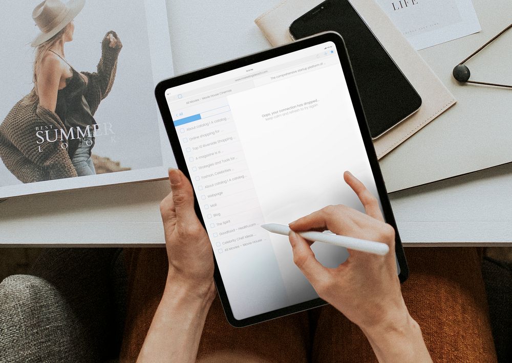 Fashion designer working on a digital tablet mockup