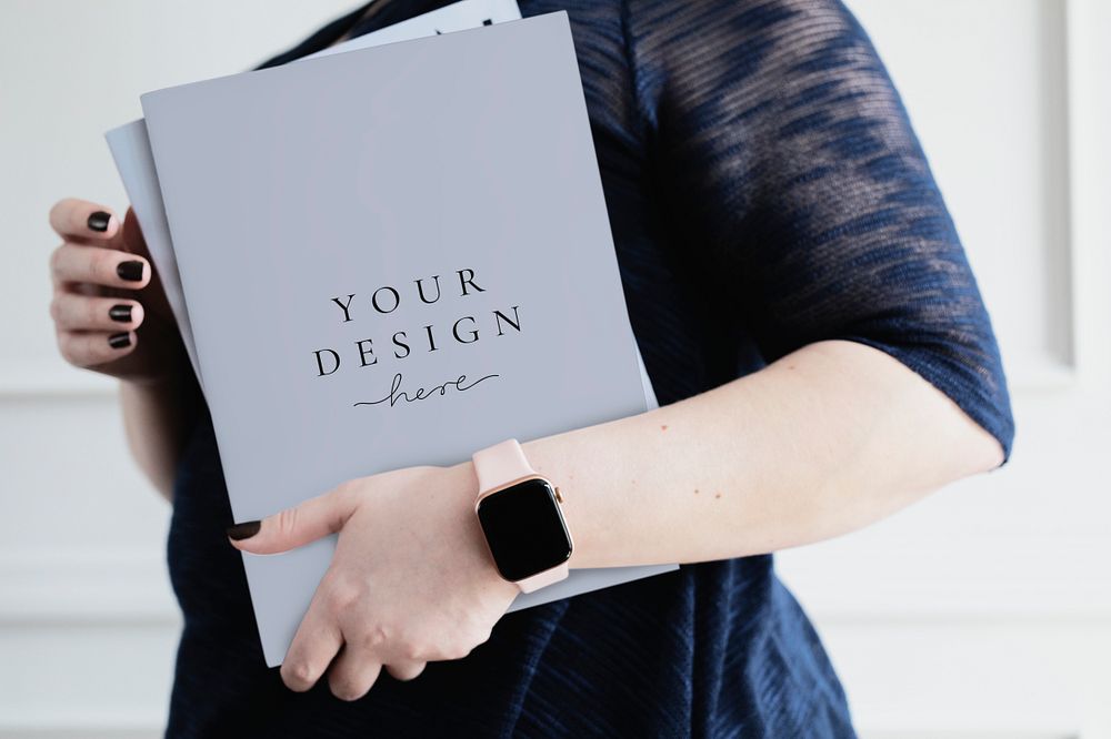 Woman carrying a folder mockup