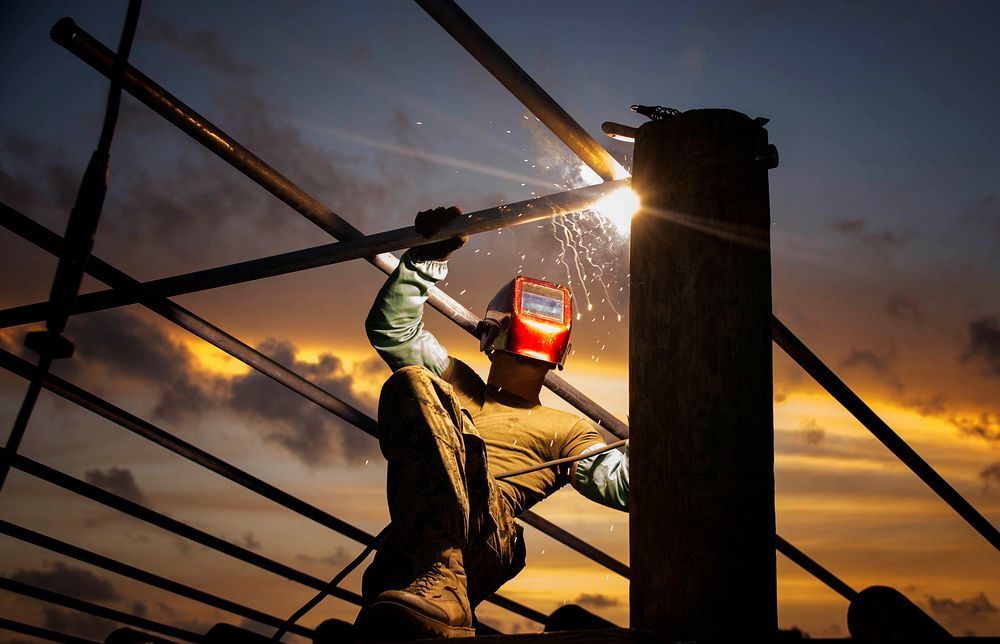 Finishing Touches. Cpl. David Merrifield, assigned to 8th Engineer Support Battalion, puts the finishing touches on an…