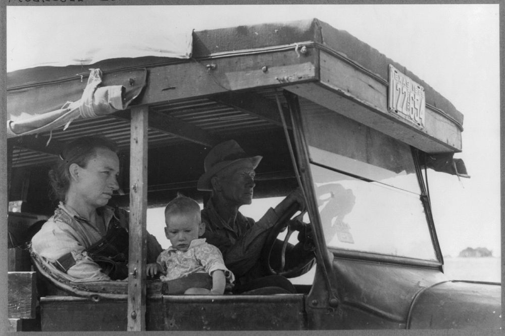 White migrant family in their automobile east of Fort Gibson, Muskogee County, Oklahoma by Russell Lee