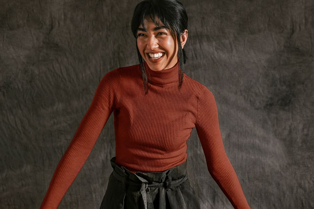 Happy woman in burgundy turtleneck sweater, autumn apparel fashion design
