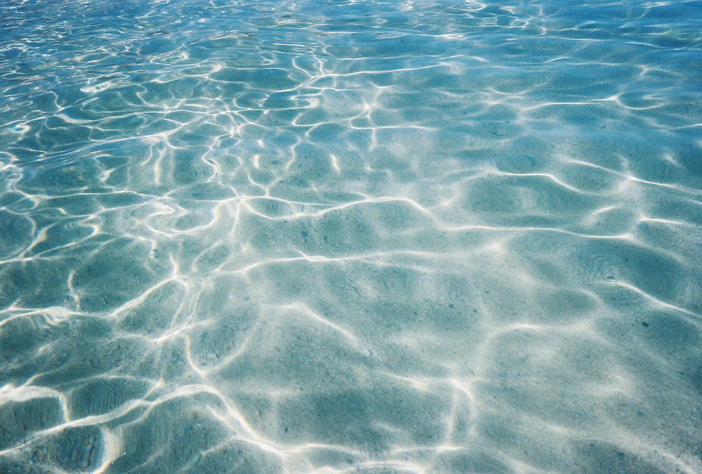 Tropical blue sea water textured
