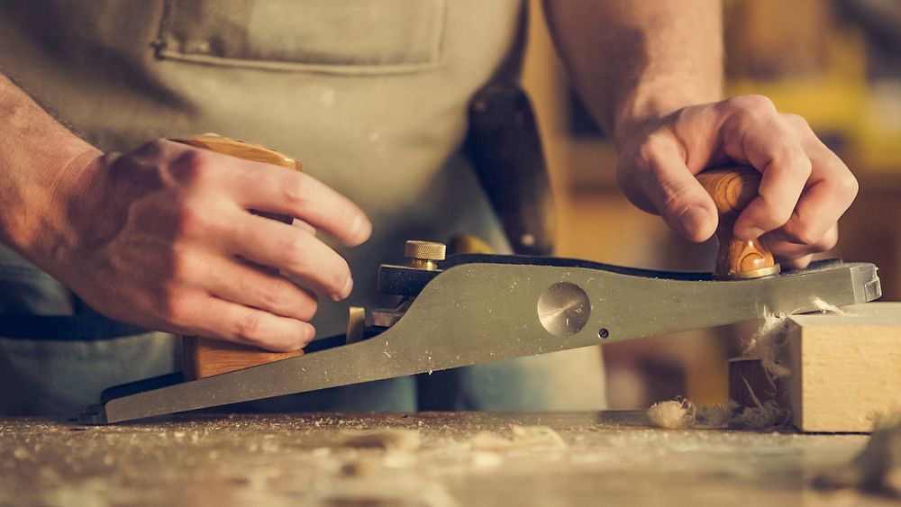 Free close-up of man working with wood image, public domain design CC0 photo. 