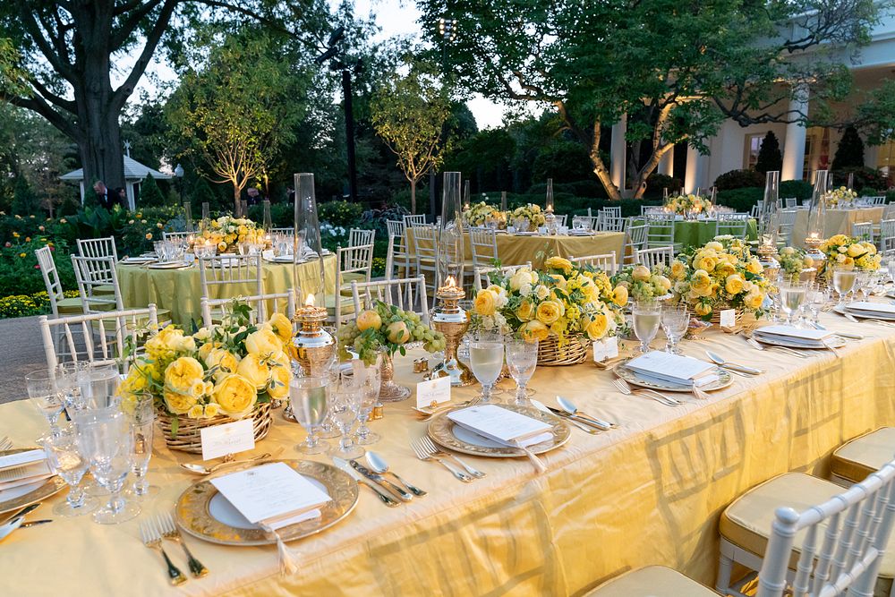 The decorated tables for the State Dinner in honor in the Rose Garden of the White House. Original public domain image from…