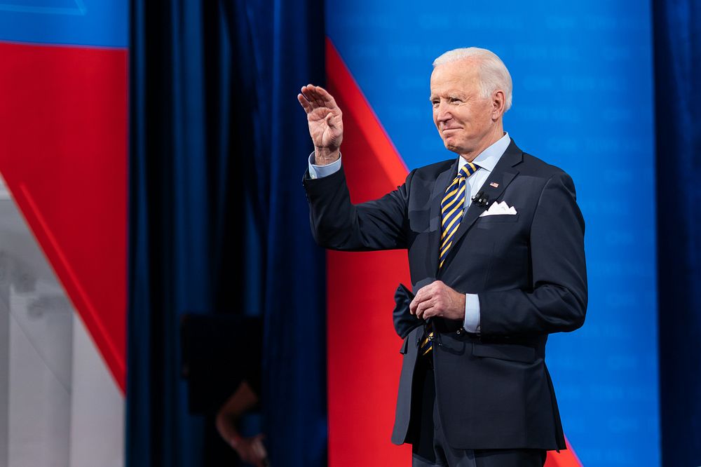 President Joe Biden waves to the guests during a CNN Town Hall with Anderson Cooper Monday, Feb. 16, 2021, at the Pabst…