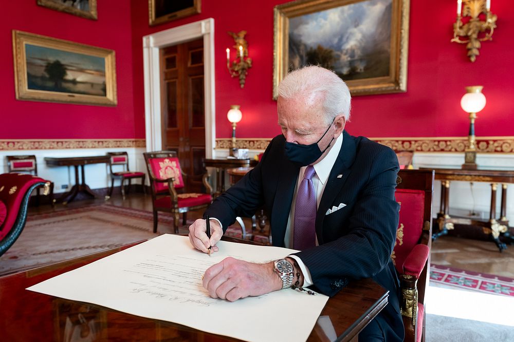 President Joe Biden signs the commission for Avril Haines to be the Director of National Intelligence Thursday, Jan. 21…