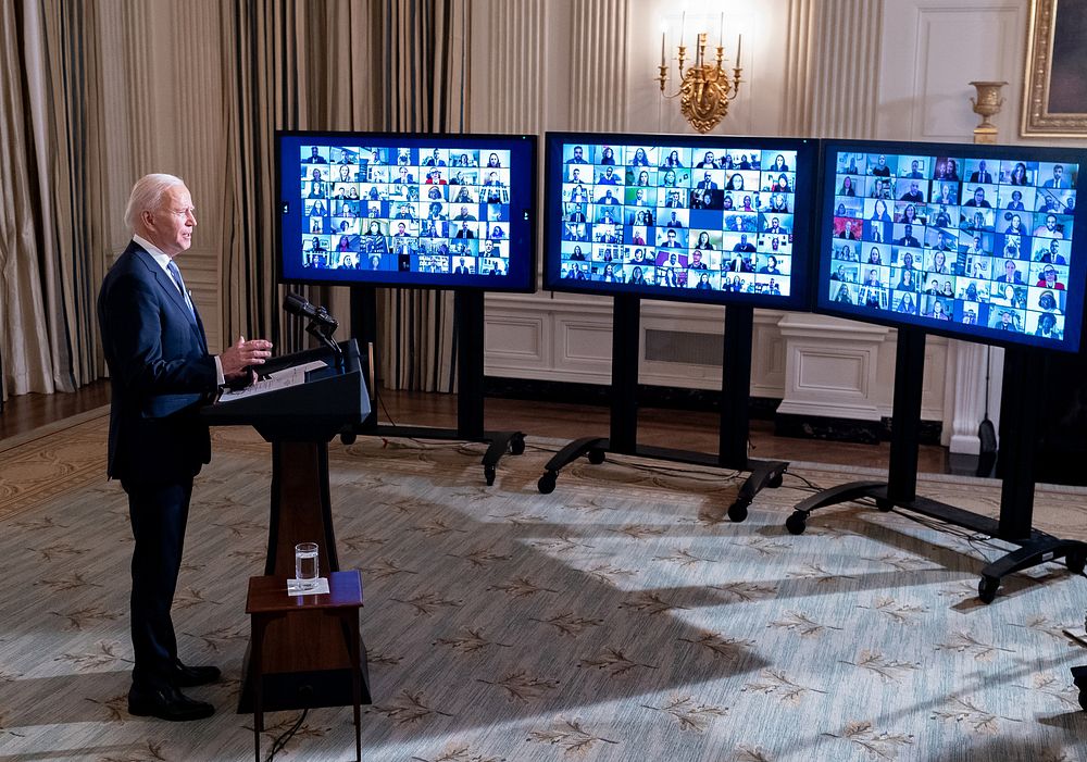 President Joe Biden participates in a virtual swearing-in ceremony of top aides and appointees Wednesday, Jan. 20, 2021, in…