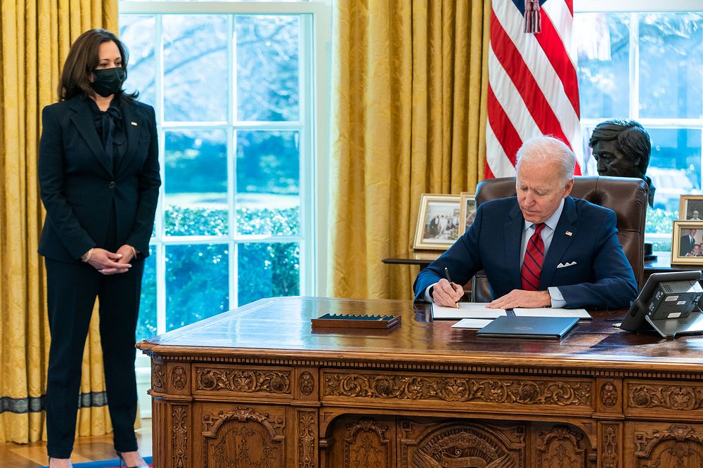 President Joe Biden, joined by Vice President Kamala Harris, signs two executive orders on healthcare Thursday, Jan. 28…