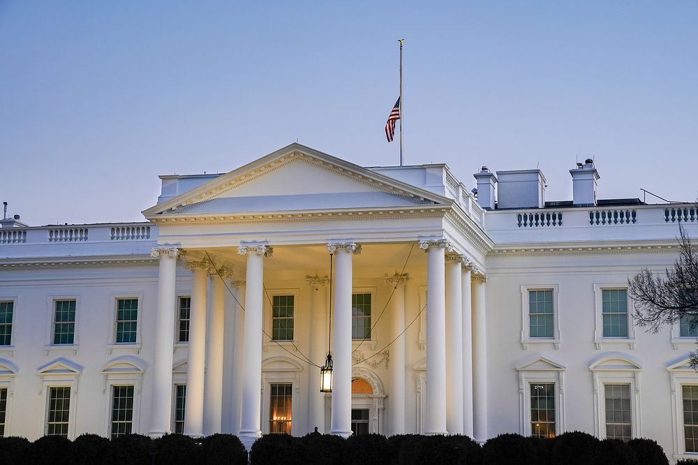 The American flag flies at half staff above the White House Monday, Feb. 22, 2021, in honor of the 500,000 Americans who…