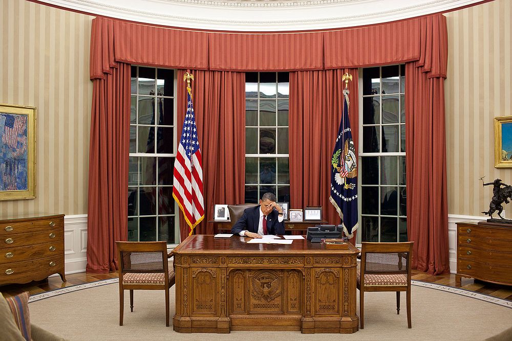 President Barack Obama edits his remarks in the Oval Office prior to making a televised statement detailing the mission…