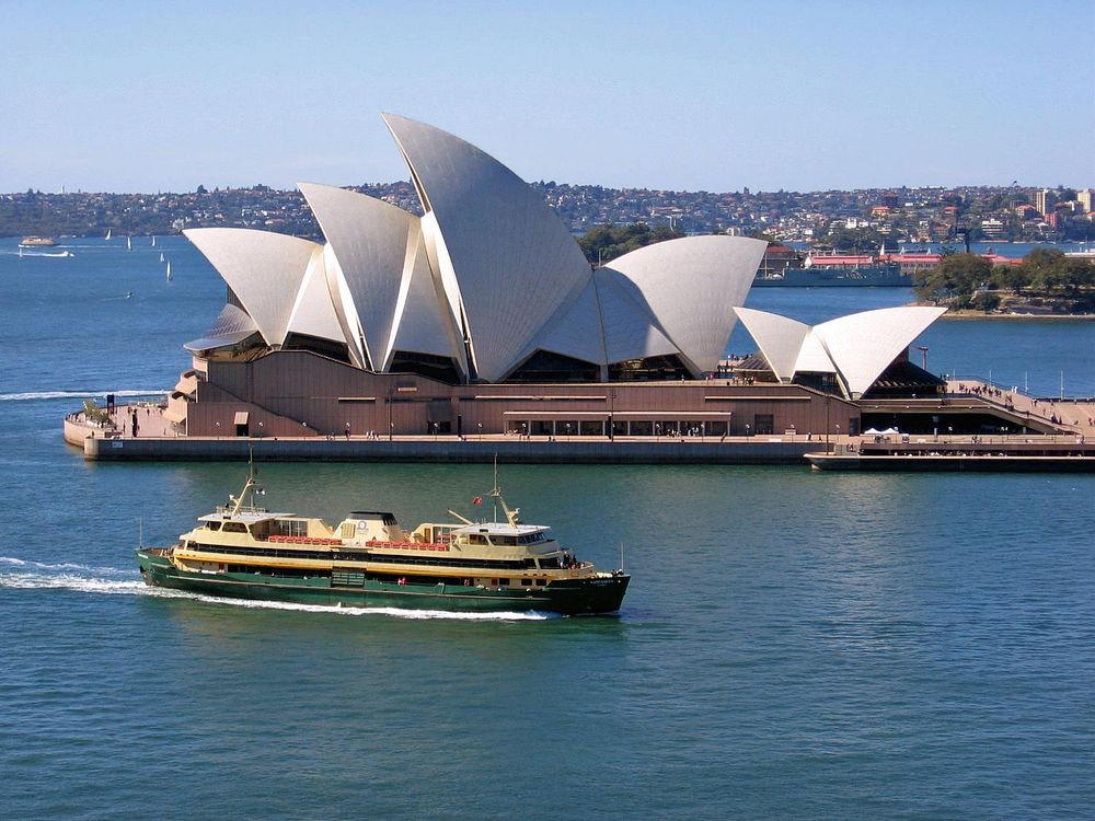 The Manly Ferry cruises past the Sydney Opera House. Original public domain image from Flickr