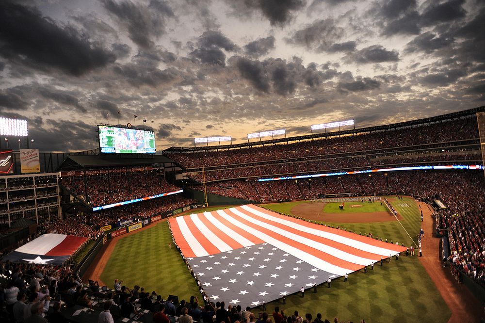 U.S. Service members with the Texas Military Forces participate in Game 3 of the Major League Baseball World Series in…