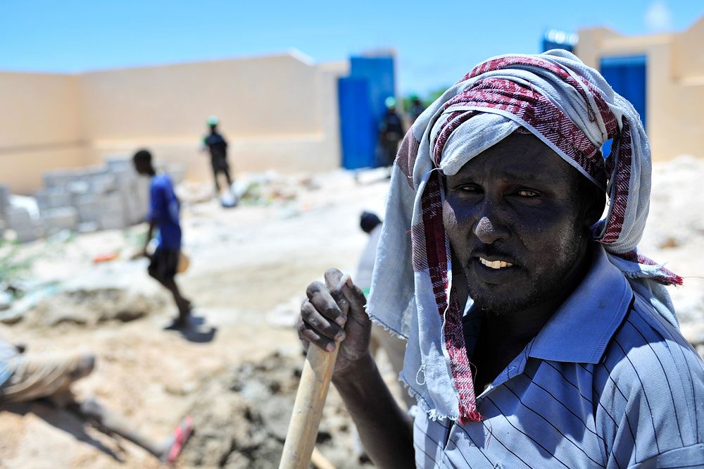Builders work to construct a school as part of AMISOM's humanitarian mission in Somalia.