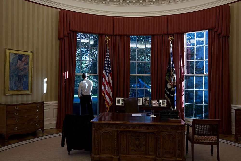 President Barack Obama looks out the window of the Oval Office, Sept. 17, 2013.