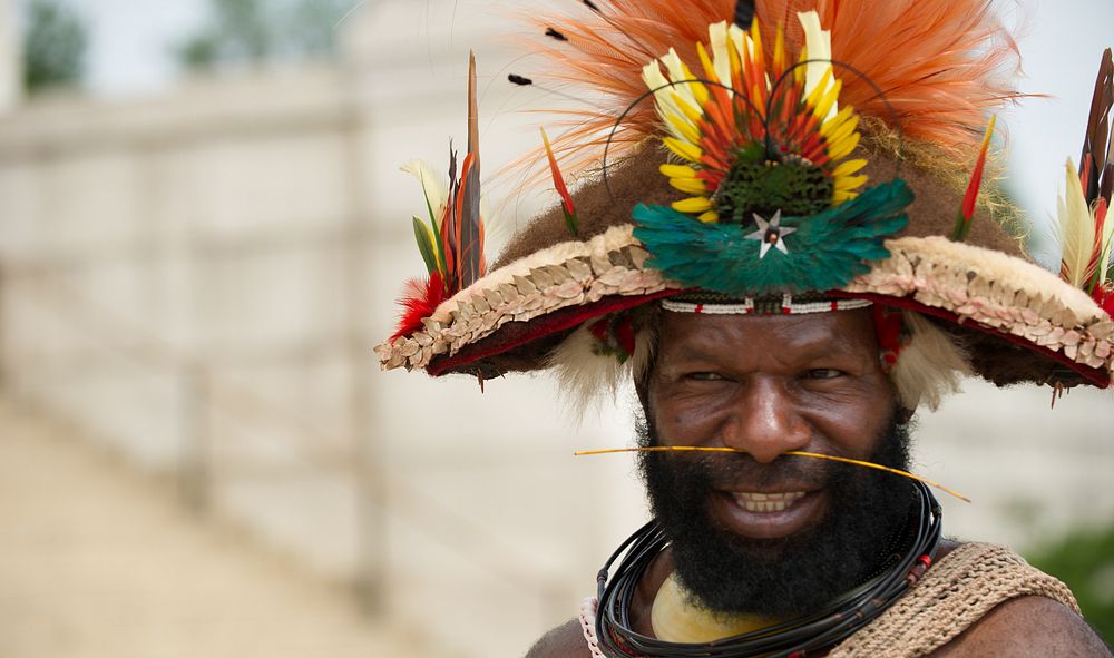 A man in a tribal costume smiles for a photo June 18, 2014, Washington D.C., VA. The memorial which honors Abraham Lincoln…