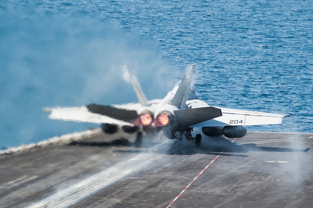 A U.S. Navy F/A-18F Super Hornet aircraft assigned to Strike Fighter Squadron (VFA) 213 launches from the flight deck of the…