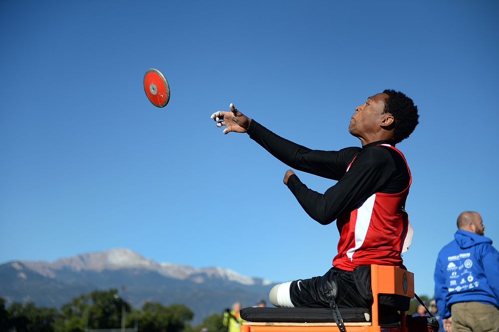 Marine Corps team Sgt. Anthony McDaniel Jr. throws the discus during the 2014 Warrior Games in Colorado Springs, Colo. Sept.…