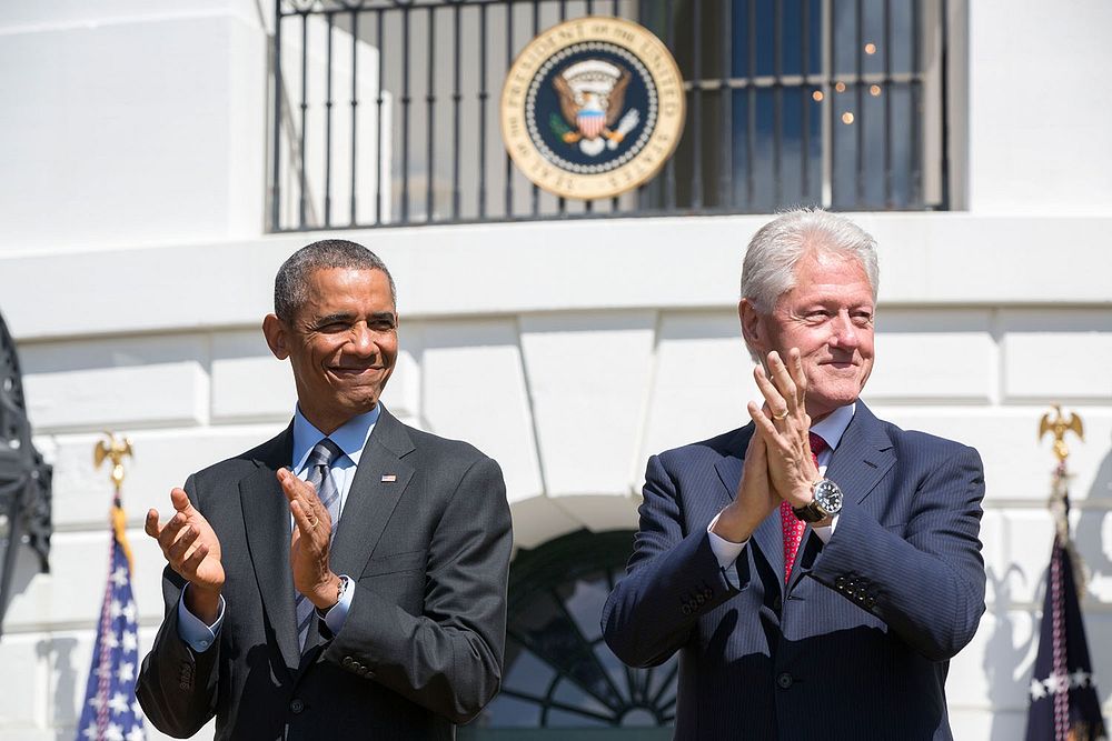 President Barack Obama and former President Bill Clinton applaud during the 20th anniversary of the AmeriCorps national…