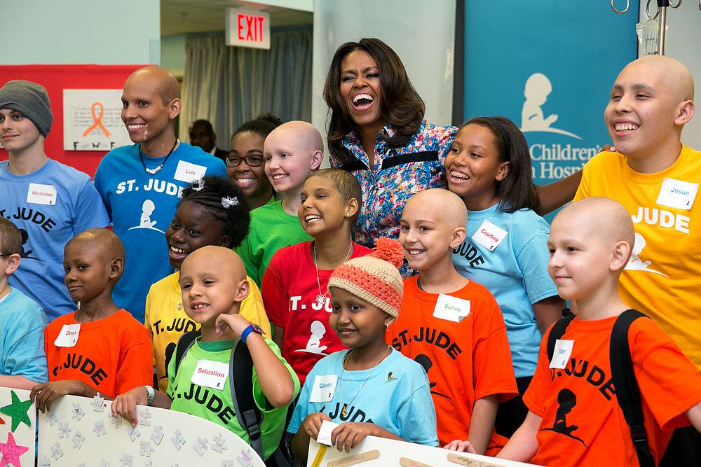 First Lady Michelle Obama joins children for a group photo during a visit to St. Jude Children's Research Hospital in…