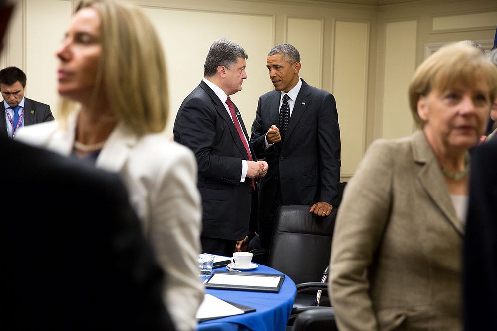 President Barack Obama speaks with President Petro Poroshenko of Ukraine following a meeting with leaders from Italy…