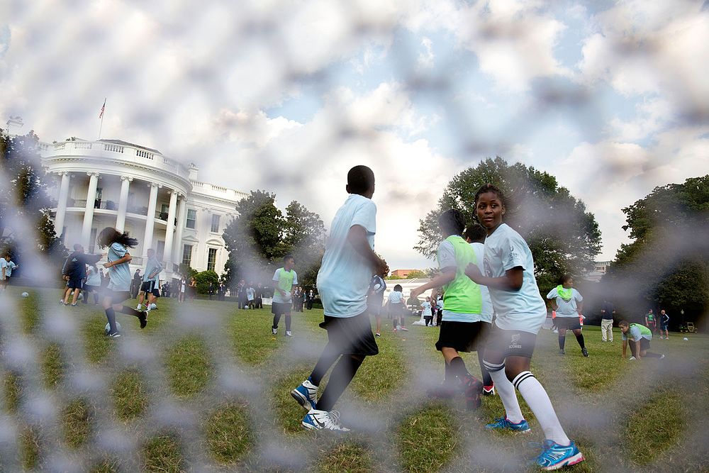 Students from DC Scores participate in a soccer clinic on the South Lawn of the White House following President Barack…