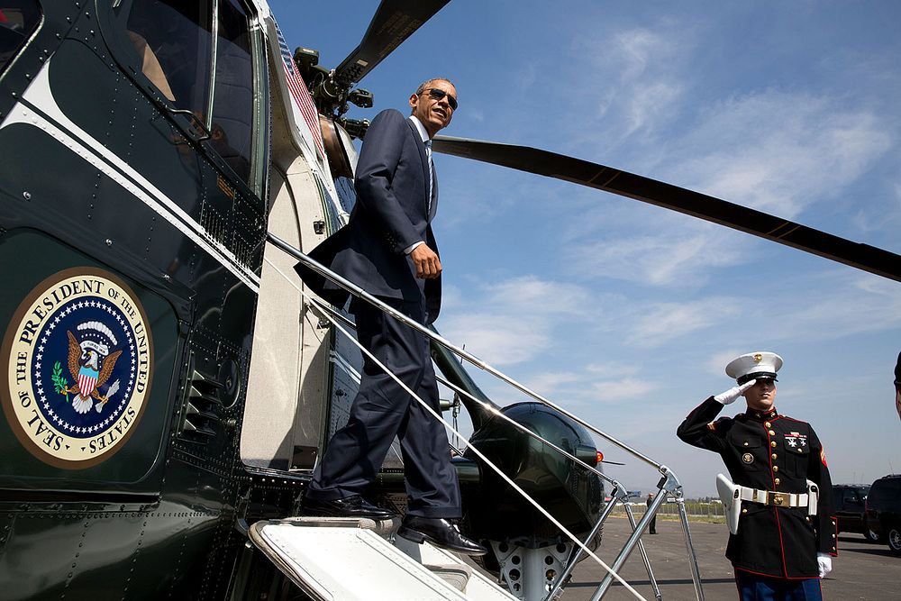 President Barack Obama disembarks Marine One at the Brackett Field landing zone in San Dimas, Calif., Oct. 10, 2014.