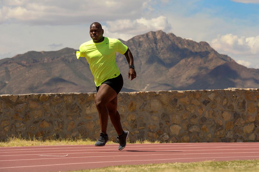 Retired Army Spc. Haywood Range III runs track during Army Trials at Fort Bliss in El Paso, Texas April 1, 2015. Athletes in…