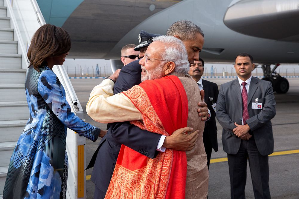 President Barack Obama, with First Lady Michelle Obama, greets Prime Minister Narendra Modi upon arrival at Air Force…