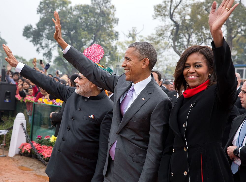 President Barack Obama, First Lady Michelle Obama and Prime Minister Narendra Modi wave to the crowd following the Republic…