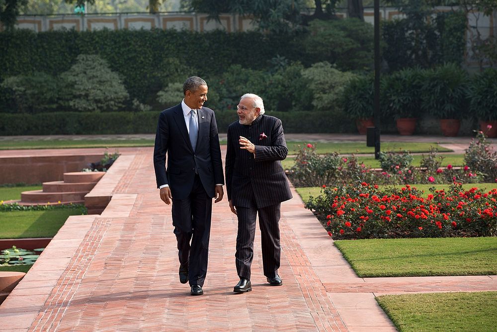 President Barack Obama and Prime Minister Narendra Modi walk in the garden at Hyderabad House in New Delhi, India, Jan. 25…