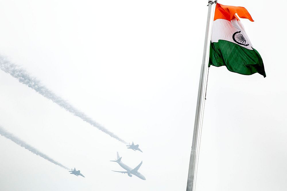 A military flyover takes place despite inclement weather during the Republic Day Parade in New Delhi, India, Jan. 26, 2015.