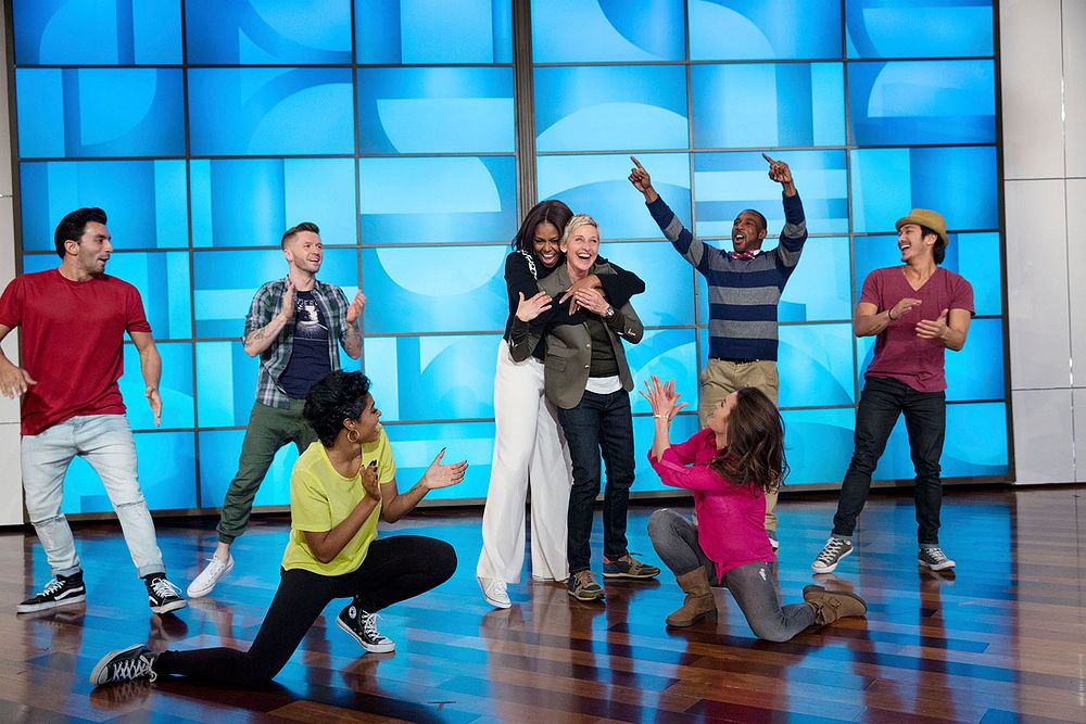 First Lady Michelle Obama hugs Ellen DeGeneres after they perform a #GimmeFive "Let's Move!" dance with the "So You Think…