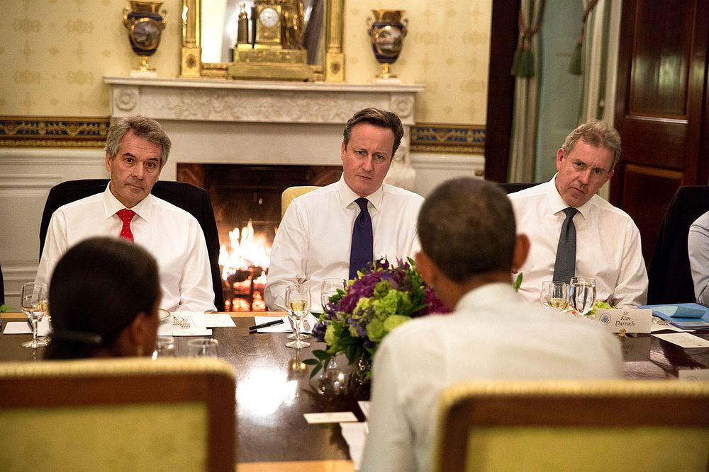 President Barack Obama and Prime Minister David Cameron of the United Kingdom meet with their delegations during dinner in…