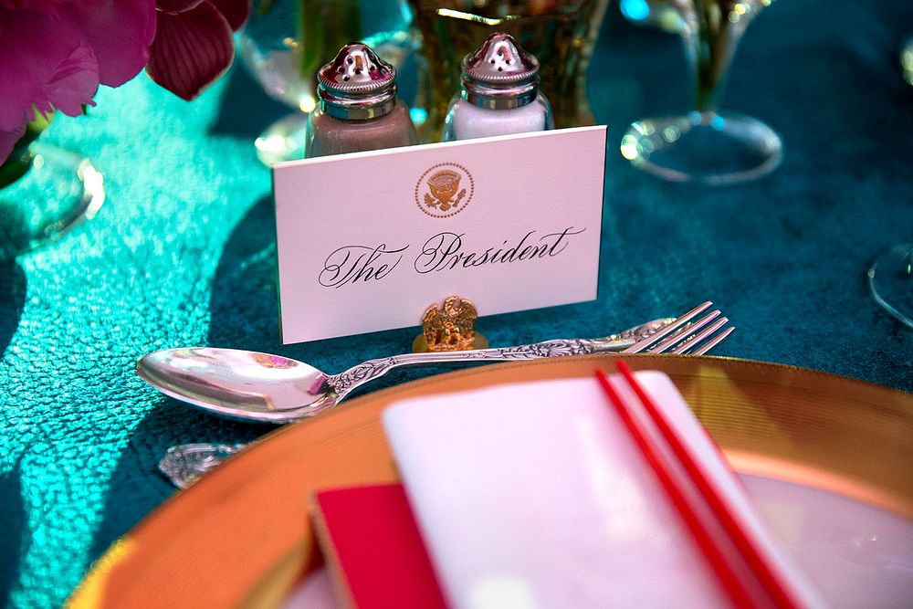 President Barack Obama's place is set at the table prior to the State Dinner for Prime Minister Shinzo Abe of Japan in the…