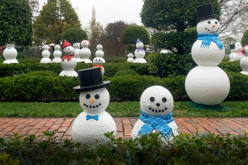 Snowmen, 56 in all decorating the White House grounds, represent each of the United States territories at the White House in…