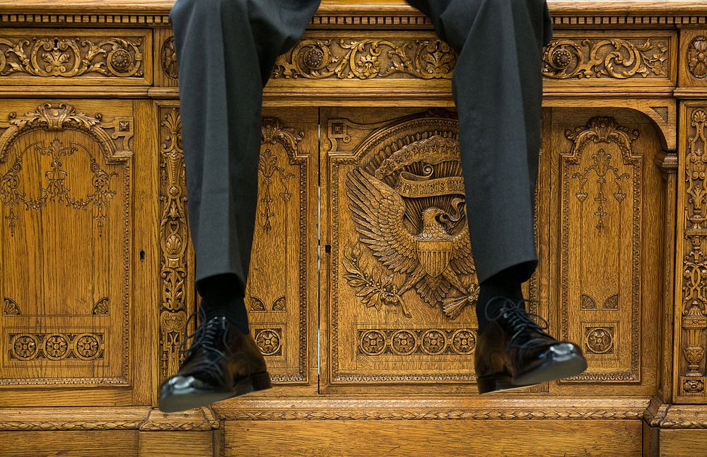 "I focused on the detail of the Resolute Desk as the President was talking with two aides in the Oval Office."(Official…
