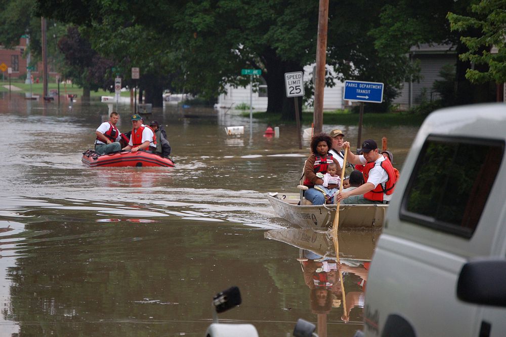 Rescued Flood Victims, Coralville, IARescuing flood victims in Coralville, IA (photography: Don Becker, USGS). Original…