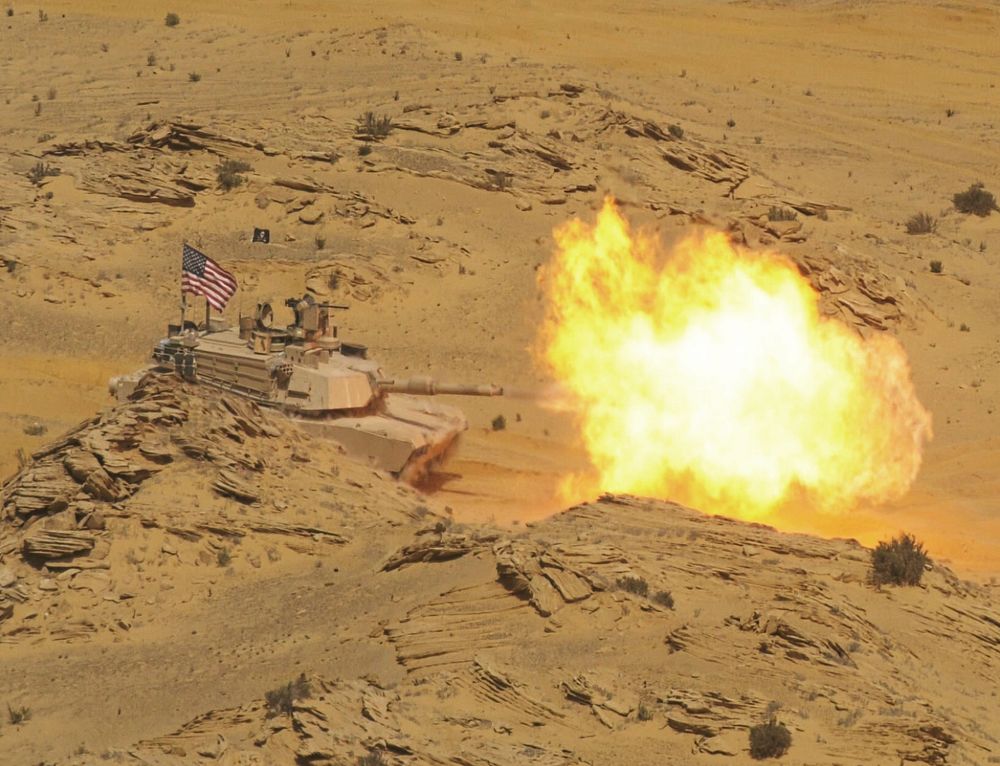 A U.S. Army M1A2 Abrams main battle tank fires during a Combined Arms Live Fire Exercise rehearsal at Mohamed Naguib…