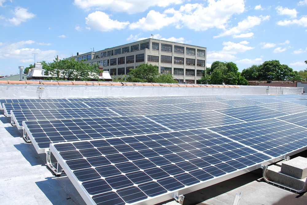 This rooftop array is 54 kW and located in Queens, NY. Original public domain image from Flickr