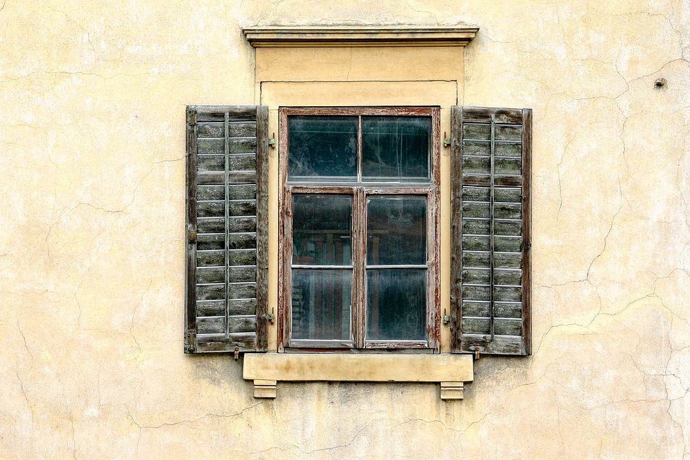 Rustic wall with old wooden window. Free public domain CC0 photo.