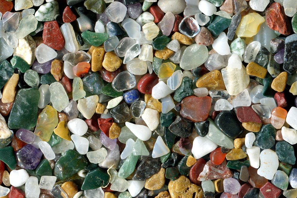 Pebbles texture background, colorful stones pile