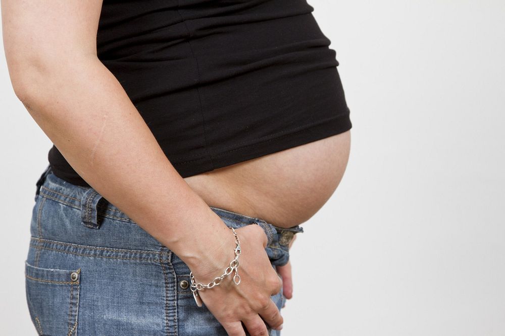 Pregnant woman and belly. Free public domain CC0 photo.