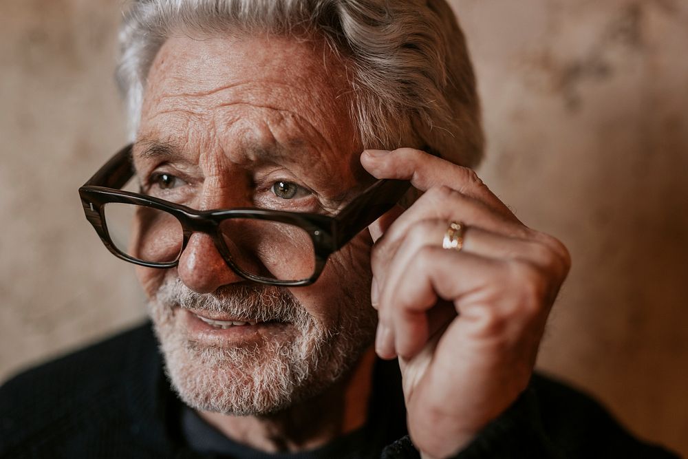 Happy grandfather wearing trendy glasses